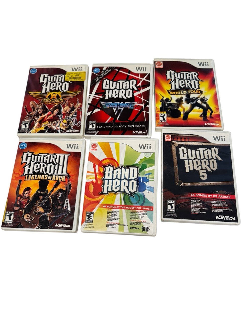 Nintendo Wii Guitar Hero Bundle Of 6 Video Games complete with manuals